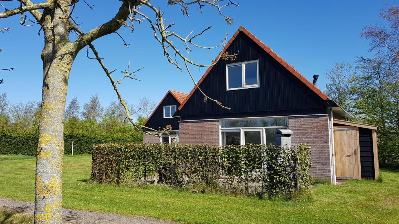 De Rakken Villa Woudsend ภายนอก รูปภาพ