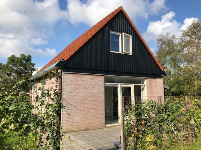 De Rakken Villa Woudsend ภายนอก รูปภาพ