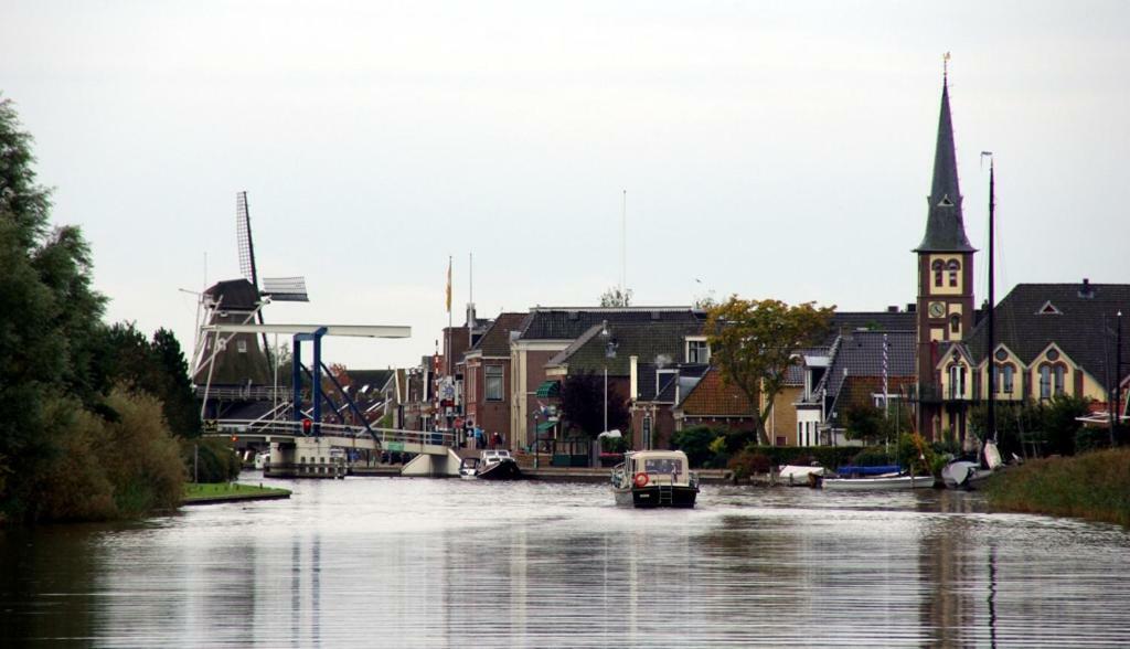 De Rakken Villa Woudsend ภายนอก รูปภาพ